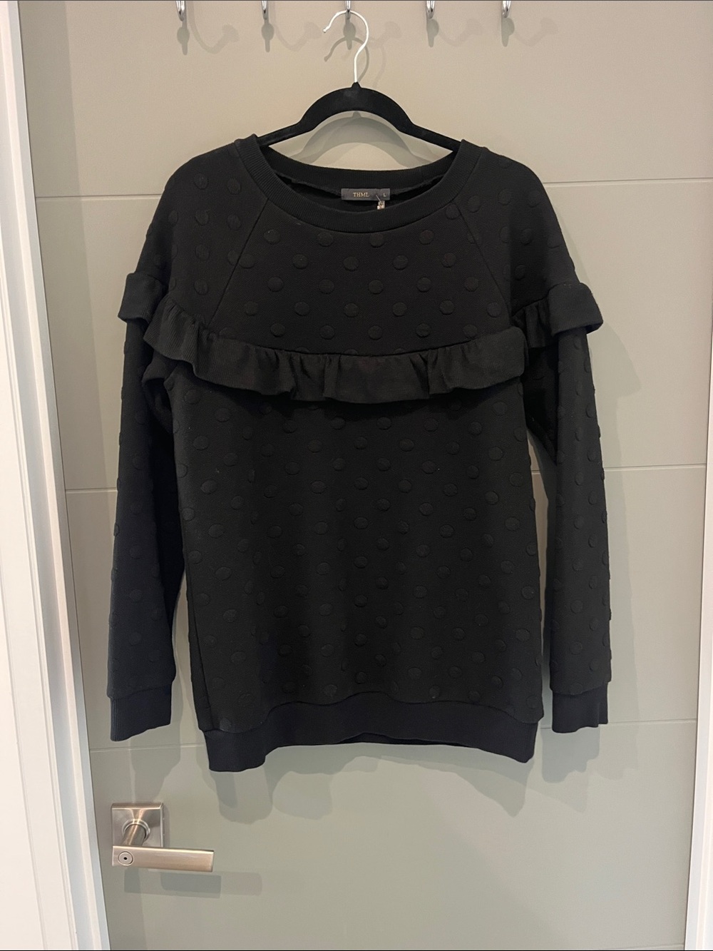 THML black crewneck sweatshirt, polkadot pattern with chest ruffle Sz L